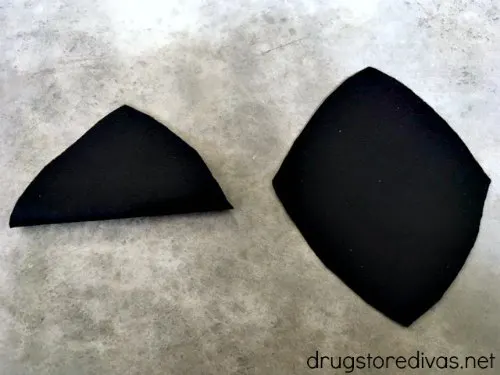 A black felt triangle and a black felt diamond.