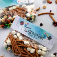 Snowman trail mix in bags with the words 