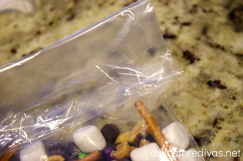 A bag of trail mix closed with tape.