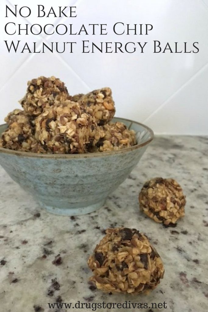 Energy balls in a bowl with the words "No Bake Chocolate Chip Walnut Energy Balls" digitally written on top.