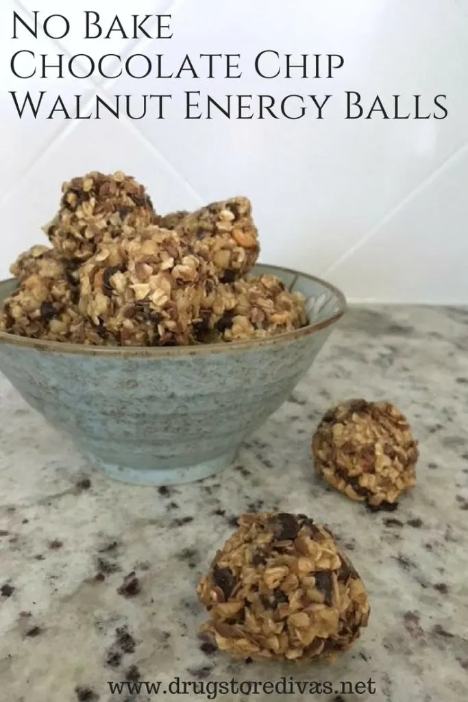 Energy balls in a bowl with the words "No Bake Chocolate Chip Walnut Energy Balls" digitally written on top.