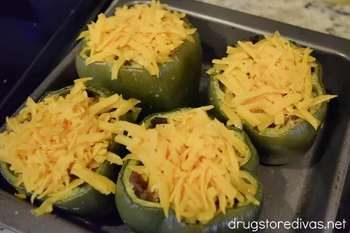 Sausage, rice, onions, and cheese combine to make these Sausage And Rice Stuffed Peppers, which are a perfect weeknight dinner meal.