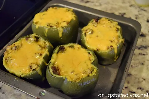 Sausage, rice, onions, and cheese combine to make these Sausage And Rice Stuffed Peppers, which are a perfect weeknight dinner meal.
