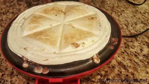 A s'mores quesadilla on a quesadilla maker.