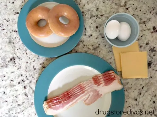 Looking for a perfect breakfast sandwich? Try this bacon, egg, and cheese doughnut breakfast sandwich from www.drugstoredivas.net.