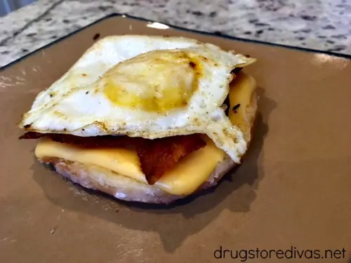 Looking for a perfect breakfast sandwich? Try this bacon, egg, and cheese doughnut breakfast sandwich from www.drugstoredivas.net.