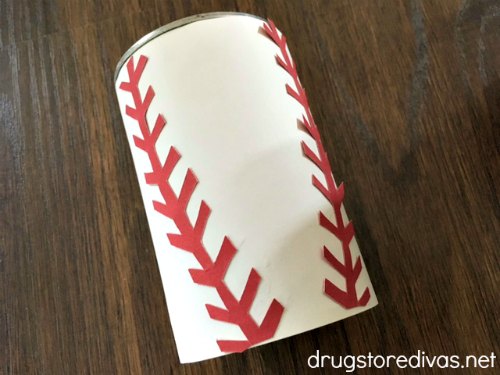 Do you have a baseball fan in your home? This DIY Baseball Pencil Holder is the perfect craft for his or her desk. Find out how to make it at www.drugstoredivas.net.