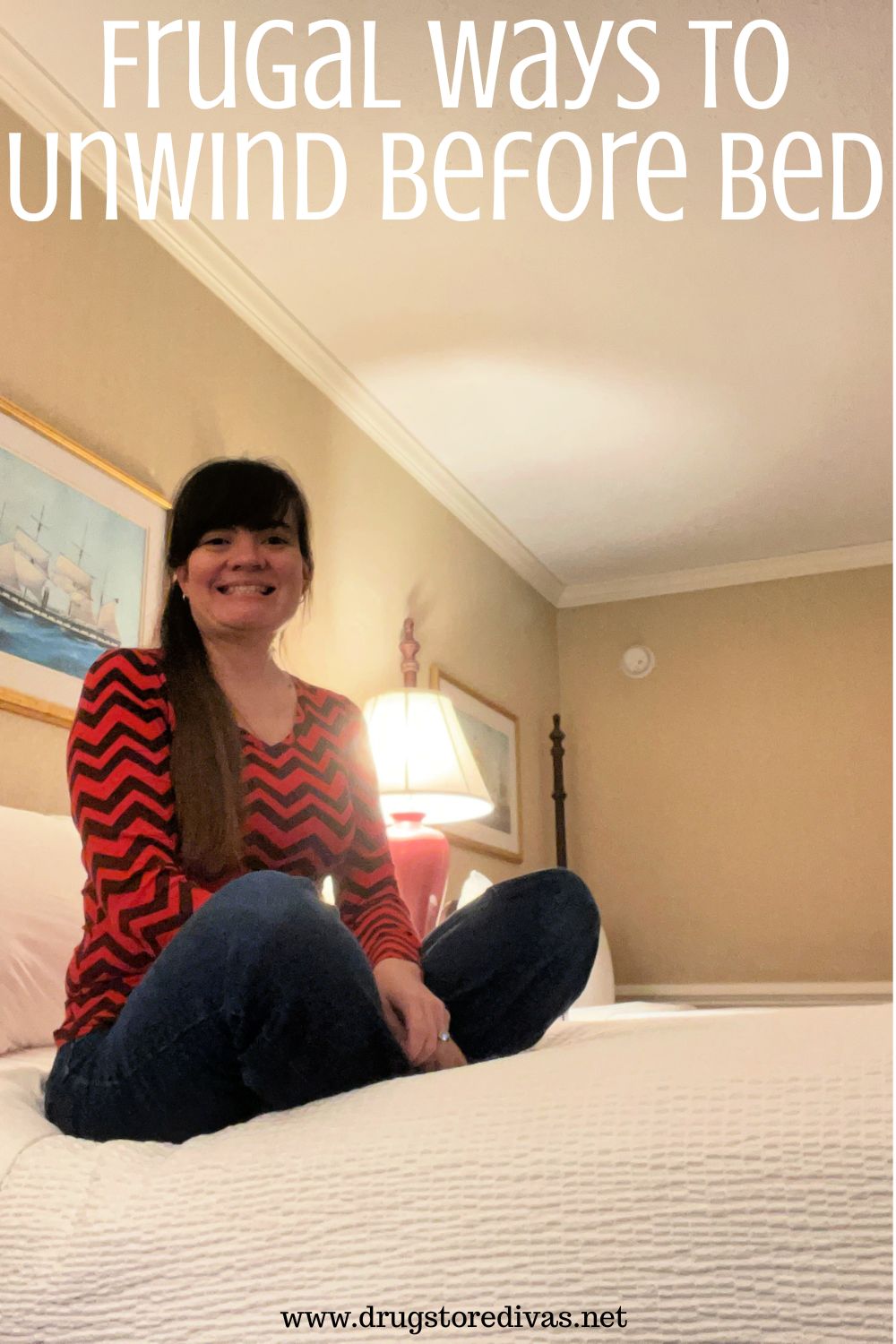 A woman in a long sleeved black and red shirt and jeans sitting on a bed with the words 