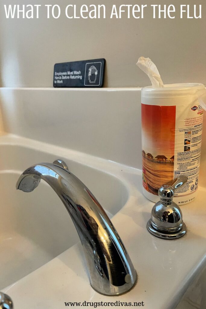 A canister of cleaning wipes on the side of a bathtub with the words "What To Clean After The Flu" digitally written on top.