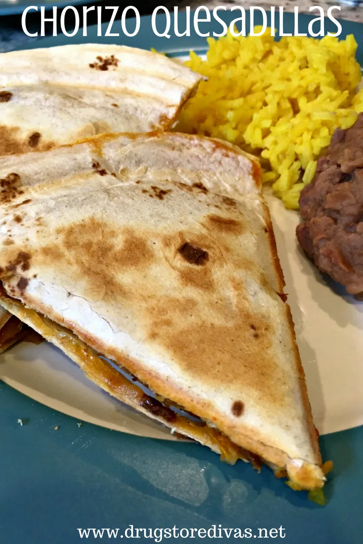 Quesadilla pieces, plus rice and beans, on a plate with the words "Chorizo Quesadillas" digitally written on top.