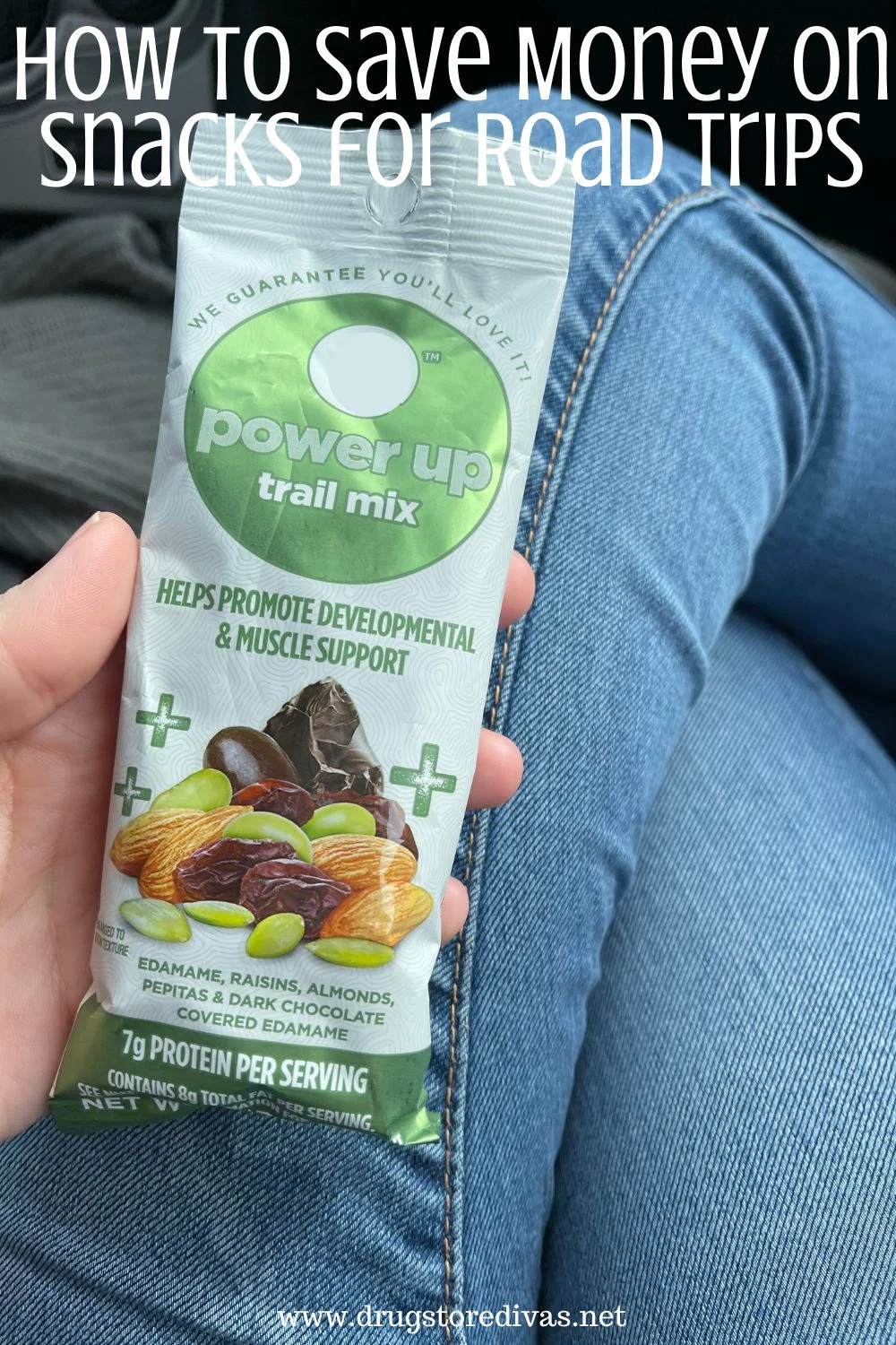 A hand holding a bag of mixed nuts in the car with the words 