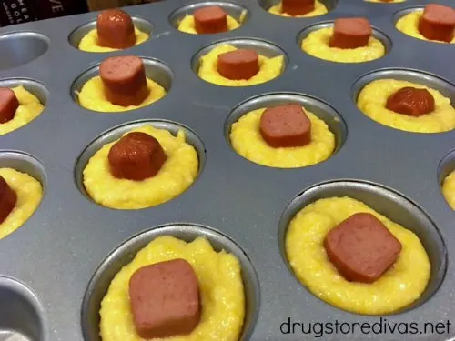 Corn Dog Muffins are the perfect snack dinner or potluck recipe. Get the recipe at www.drugstoredivas.net.