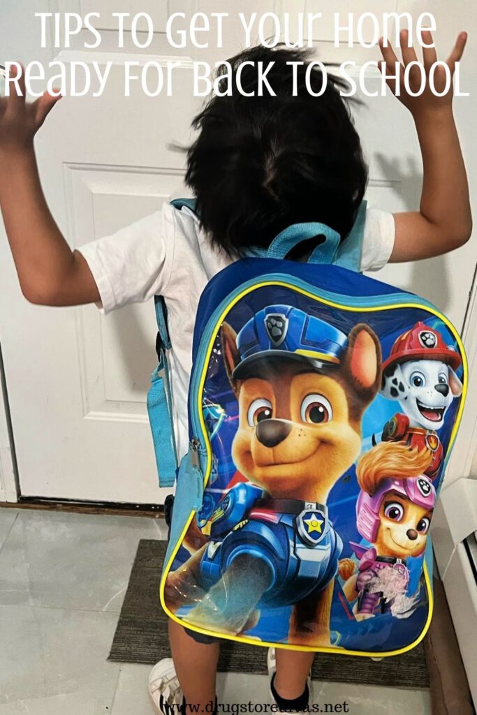 A little boy wearing a backpack with the words "Tips To Get Your Home Ready For Back To School" digitally written above him.