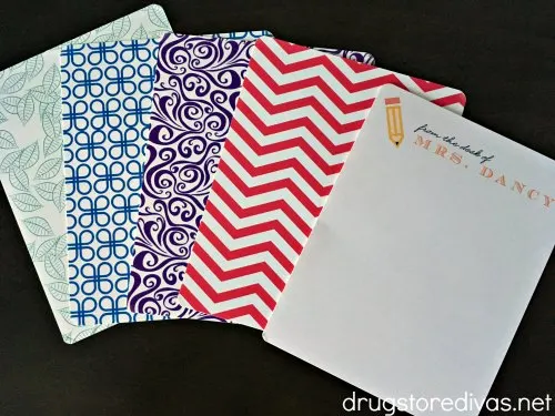 Five pieces of personalized teacher stationery.