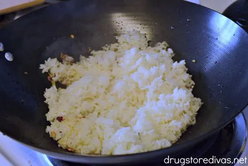 Rice cooking in a wok.