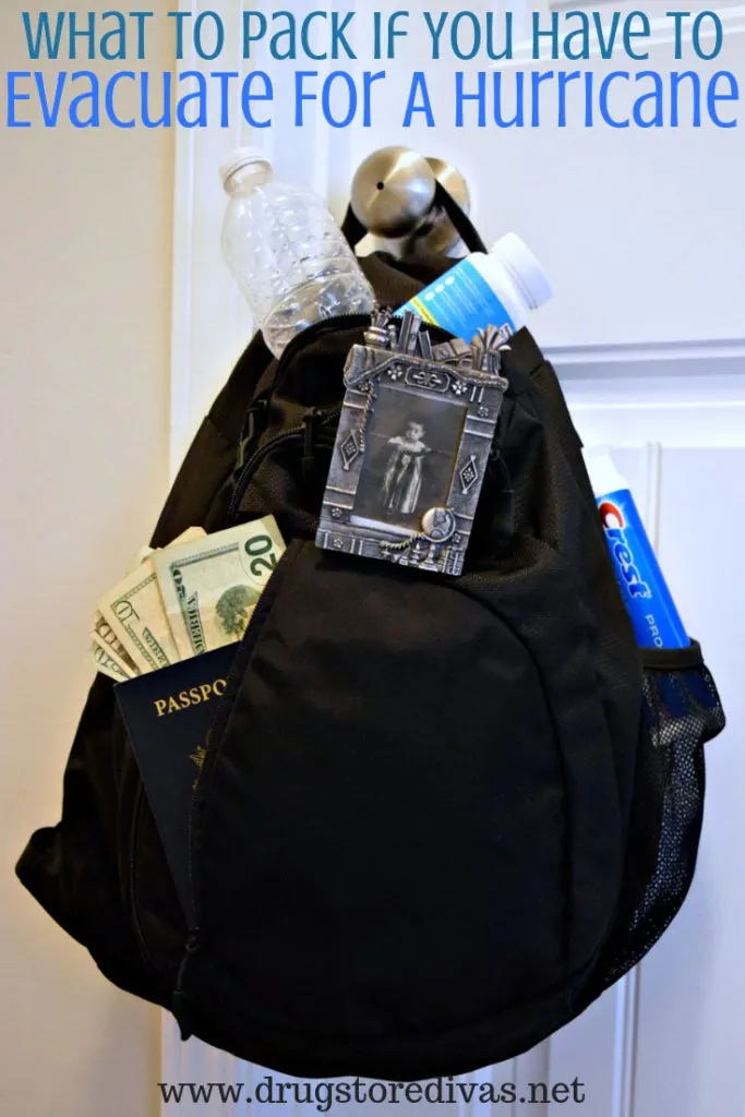 A bag packed with a passport, money, water bottle, vitamins, a picture frame, and toothpaste with the words "What To Pack If You Have To Evacuate For A Hurricane" digitally written above it.