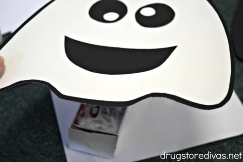 The PERFECT upcycle is this DIY Pull String Halloween Ghost Pinata made from a toothpaste box! Get the tutorial on www.drugstoredivas.net. #CrestXCVS