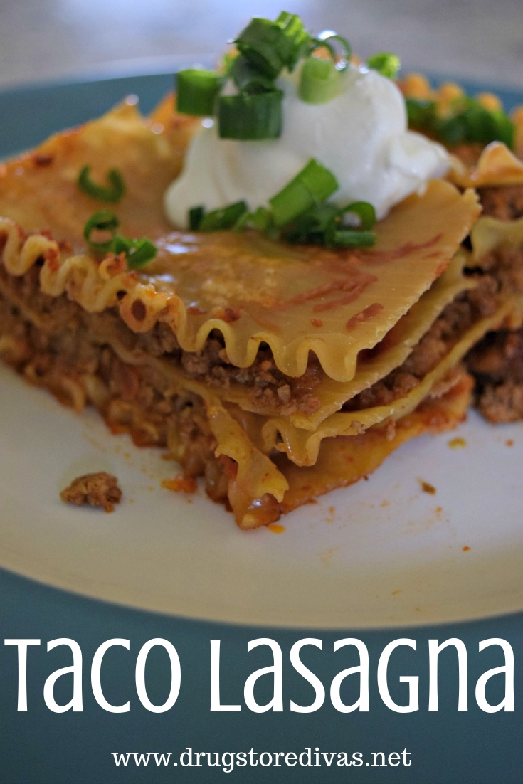 A lasagna with sour cream on top on a plate with the words 