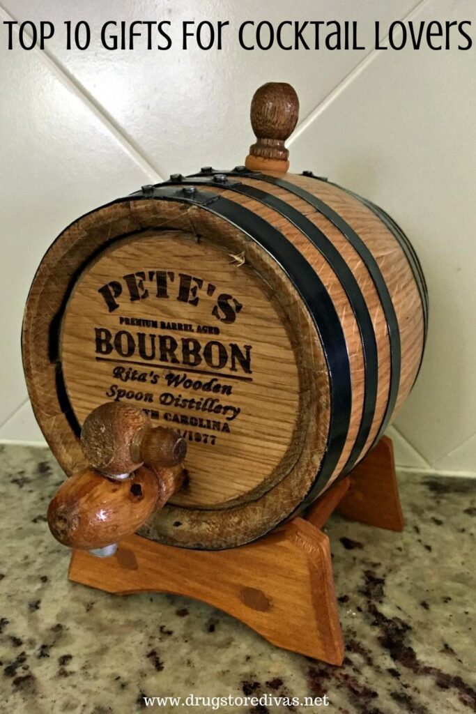 Tiny oak barrel with the words "Top Ten Gifts For Cocktail Lovers" digitally written above it.