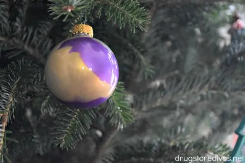 DIY Paint Swirl Ornament on a Christmas tree.
