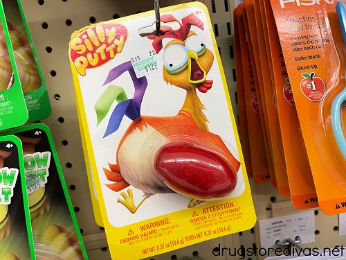 A package of Silly Putty on the shelf.
