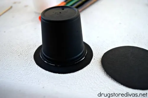 Don't throw away your K-Cups! Upcycle your used K-Cups to make this DIY K-Cup Snowman. Get the tutorial at www.drugstoredivas.net.