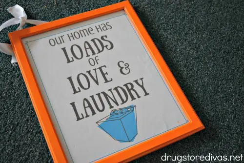 Add a little pizzazz to your home with this DIY Laundry Room Wall Art. It comes with a free printable too at www.drugstoredivas.net.