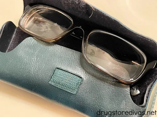 A pair of glasses and a glasses case.