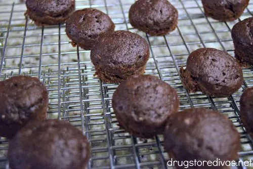 Chocolate Weight Watchers muffins cooling on a wire rack.