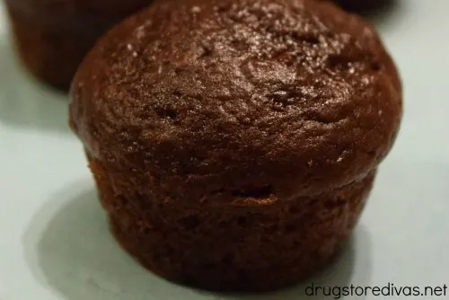 Chocolate Weight Watchers muffin on a plate.