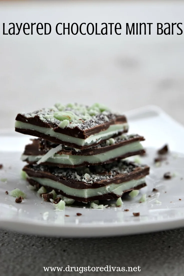 Layered Chocolate Mint Bark pieces on top of each other with the words "Layered Chocolate Mint Bars" digitally written on top.
