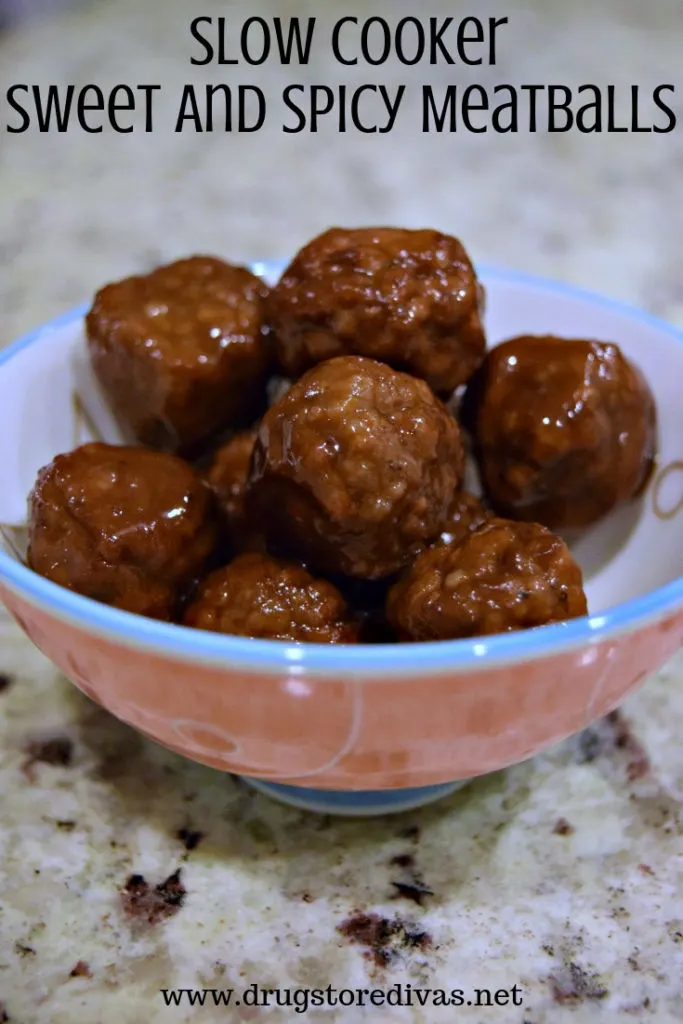 Meatballs in a bowl with the words "Slow Cooker Sweet And Spicy Meatballs" digitally written on top.