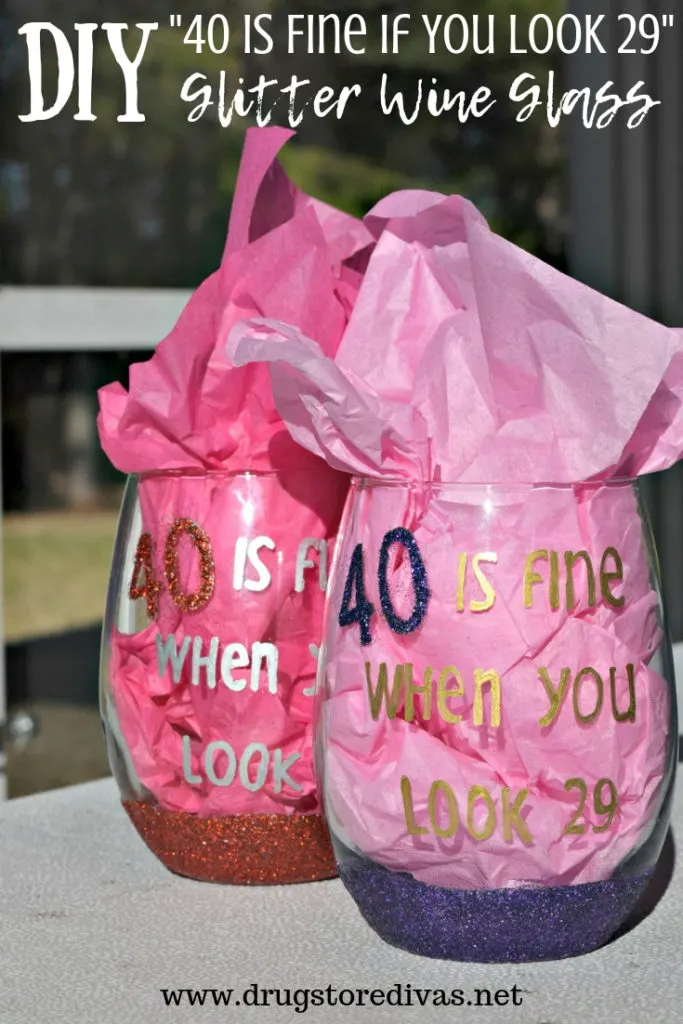 Need a gift for a 40th birthday party? Make these DIY 40 Is Fine When You Look 29 Glitter Wine Glass. Get the tutorial and printable on www.drugstoredivas.net.
