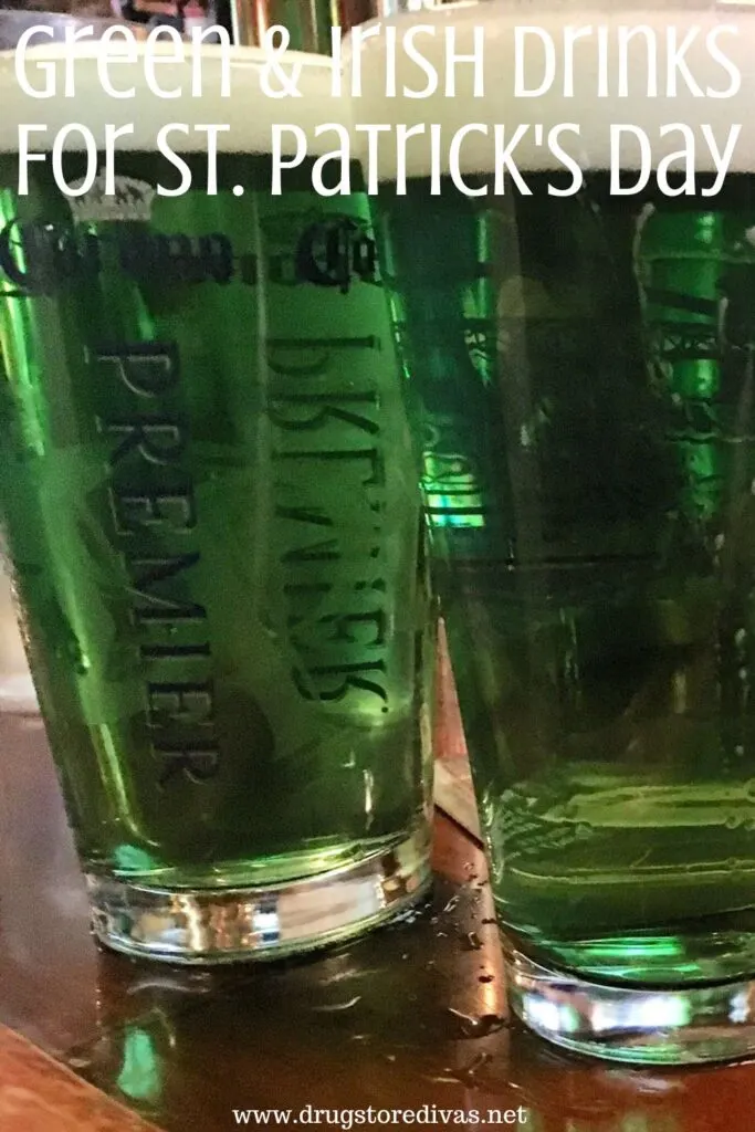 Three green beers on a bar with the words "Greens & Irish Drinks For St. Patrick's Day" digitally written on top.
