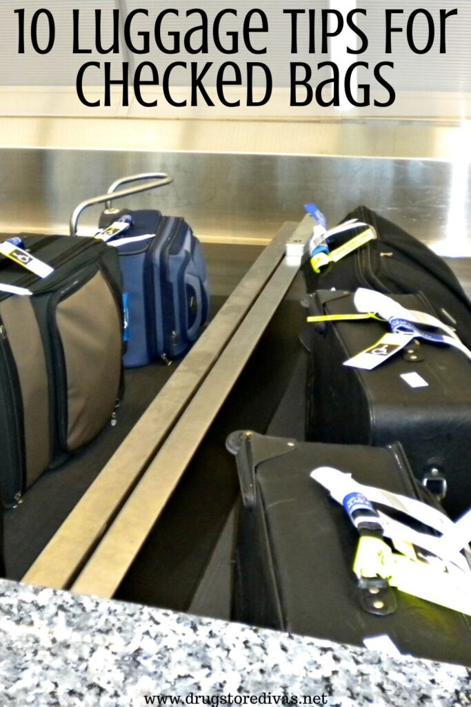 Luggage on a rack at the airport with the words "10 Luggage Tops For Checked Bags" digitally written on top.