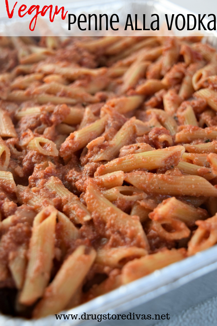 Pasta in a tray with the words 