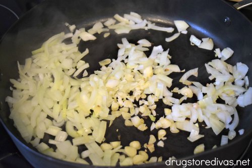 Onions and garlic in pan.