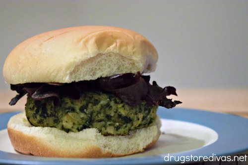 Chickpea and spinach vegan burger on a plate.