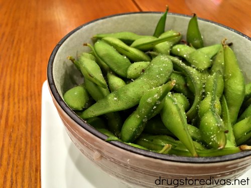 Edamame in a bowl on a table.