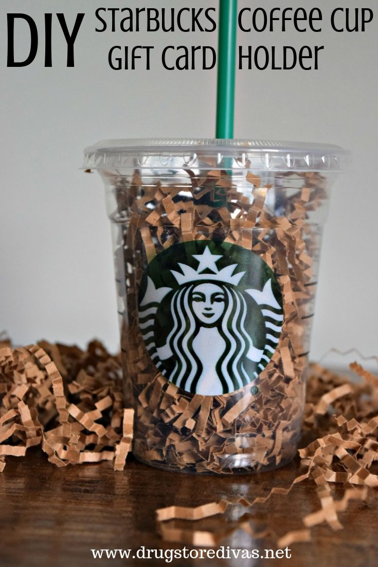 A Starbucks cup filled with brown paper shred with the words "DIY Starbucks Coffee Cup Gift Card Holder" digitally written on top.