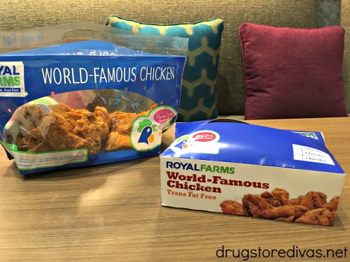 A box and bag of Royal Farms World Famous Chicken on a table.