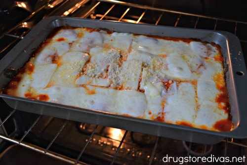 Baked Ravioli in a pan in the oven.