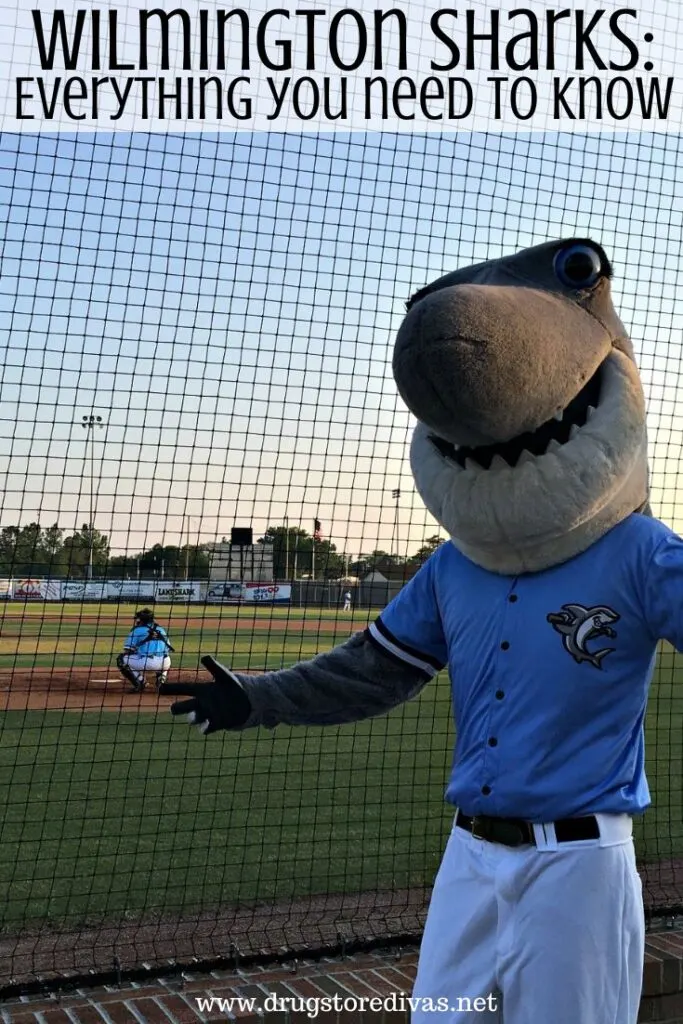 A shark mascot with a baseball game happening behind him and the words "Wilmington Sharks: Everything you need to know" digitally written above him.