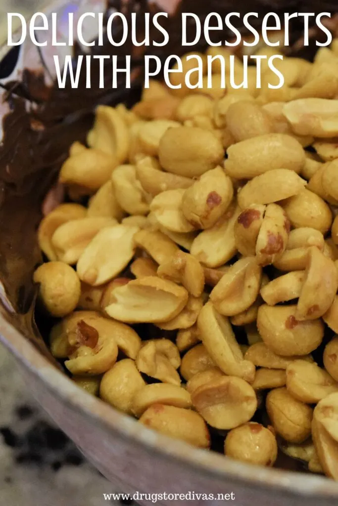 Peanuts in a bowl of melted chocolate with the words "Delicious Desserts With Peanuts" digitally written on top.