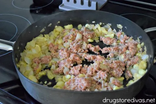 Sausage Stuffed Zucchini Boats are stuffed with sausage, tomatoes, onions, and more. They're good for keto and WW too. 