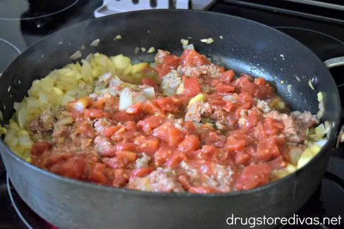 Sausage Stuffed Zucchini Boats are stuffed with sausage, tomatoes, onions, and more. They're good for keto and WW too. 