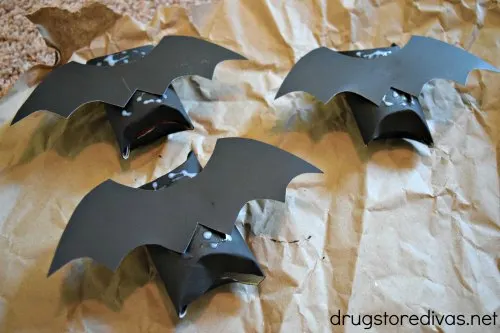 Be the talk of the town when you make these DIY Halloween Bat Candy Tubes for your trick-or-treat bowls. Find out how to make them from upcycled toilet paper rolls on www.drugstoredivas.net.