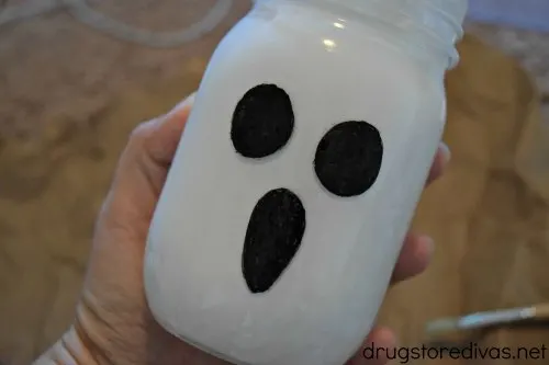 This DIY Mason Jar Ghost is sure to be your favorite homemade, upcycled Halloween decoration. Get the directions at www.drugstoredivas.net.