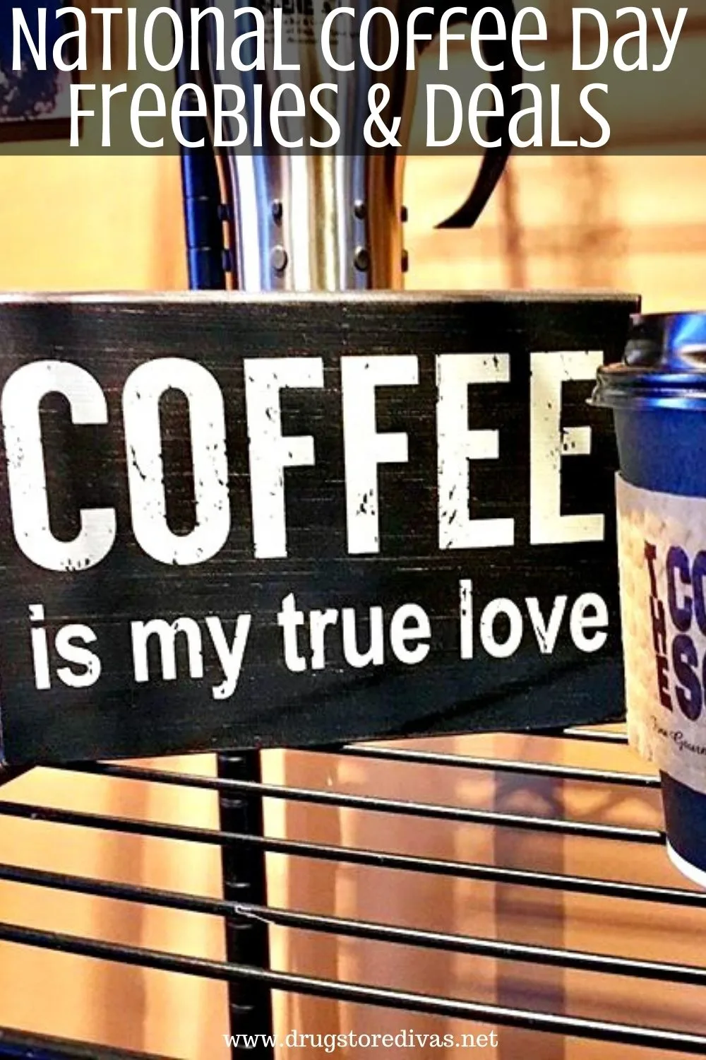 A wooden sign that says "Coffee Is My True Love" on a shelf with the words "National Coffee Day Freebies & Deals" digitally written on top.