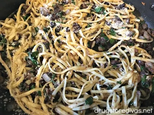 Black Bean And Kale Pasta is an easy weeknight dinner. It's meatless, and if you skip the cheese, it's vegan too. Get the recipe on www.drugstoredivas.net.